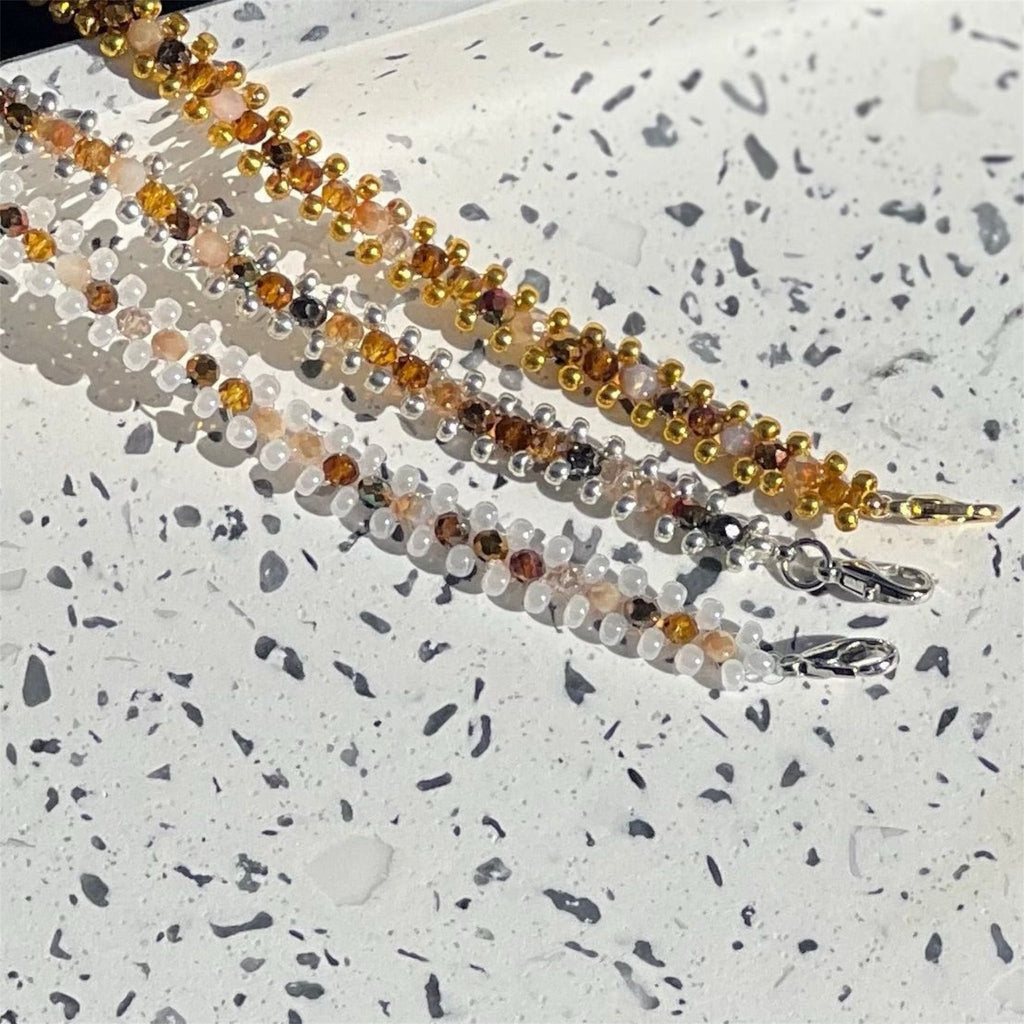 Elegant Double-Strand White and Amber Bead Bracelet