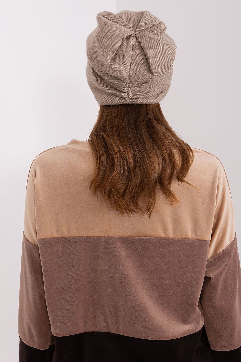 Cap- AT
