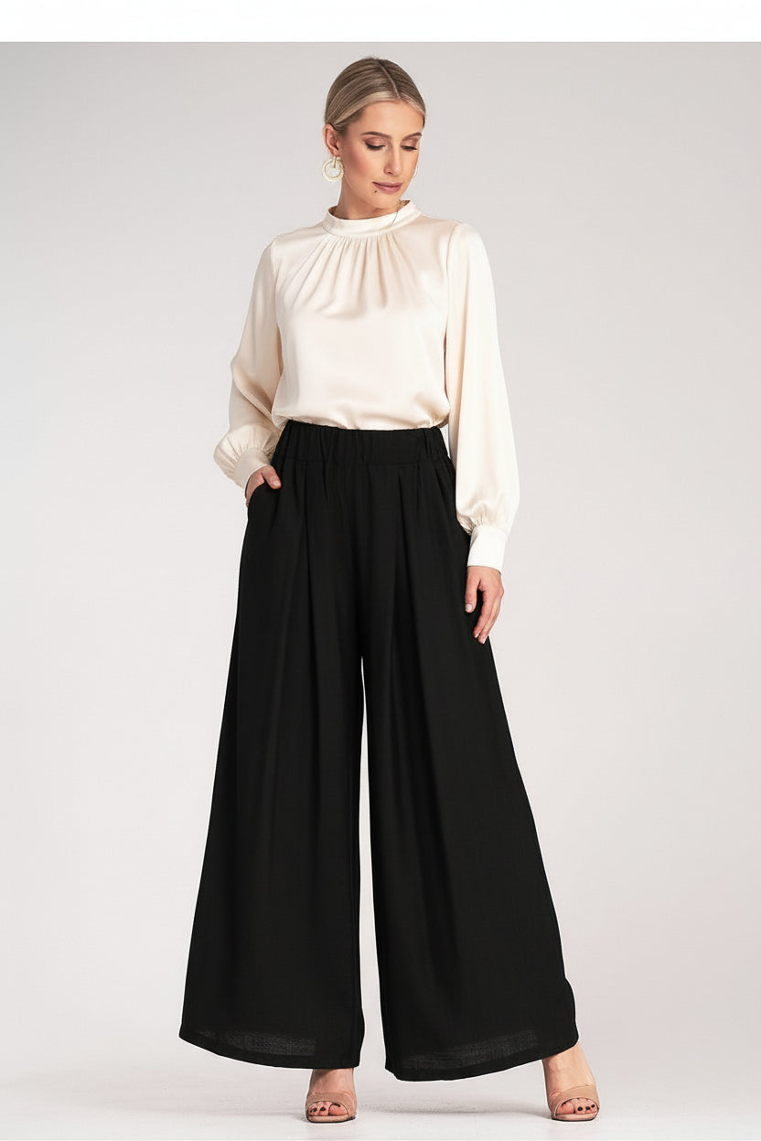 Loose, wide trousers with pleats Figl